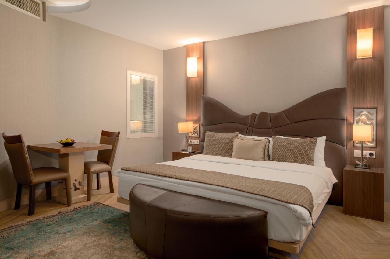 Titanic Hotel & Spa 술라이마니야 외부 사진 A bedroom at the hotel